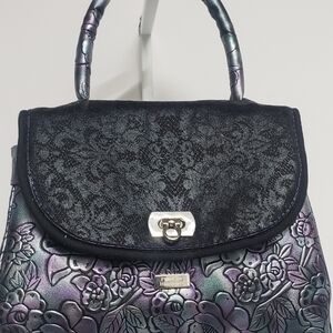 Handmade Floral Embossed Rolled Mini Handbag in Iridescent Purple-Black.